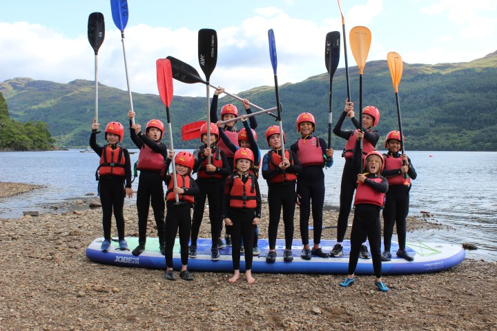 kids excited to go paddleboarding